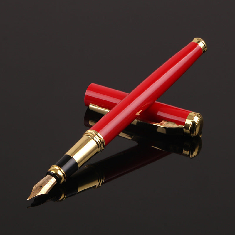 Red fountain pen with gold accents, ideal ink pens for special occasions