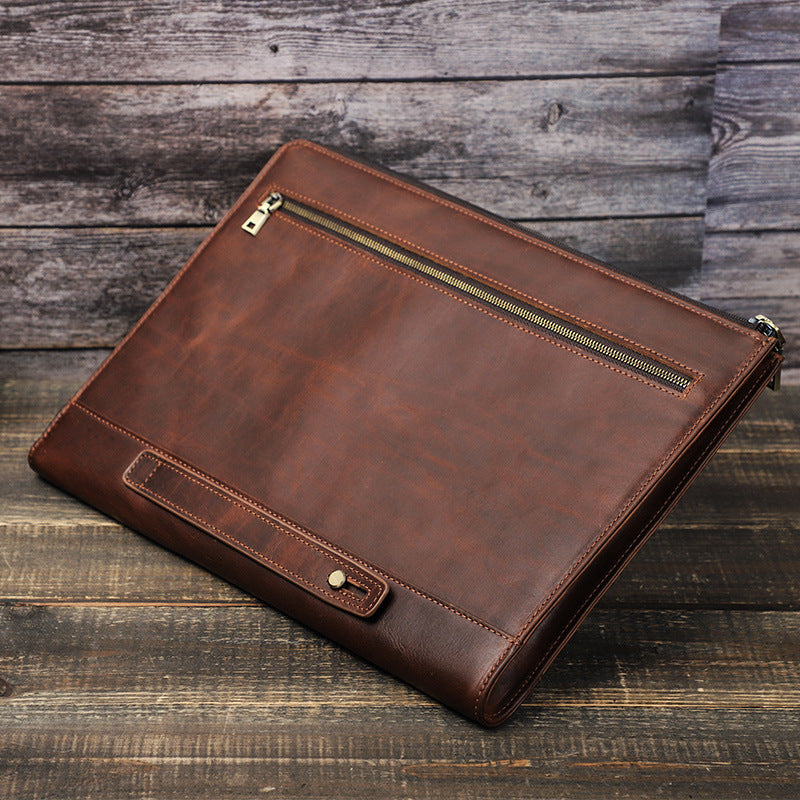 Stylish crazy horse leather laptop bag with a sleek design and zipper closure