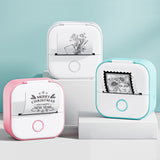 Colorful Bluetooth mini thermal label printer trio in pink, blue, and white with stylish designs