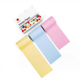 Bluetooth mini thermal label printer with three rolls of colourful label paper in yellow, blue, and pink