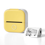 Bluetooth mini thermal label printer in yellow with a printed label showing a bus design