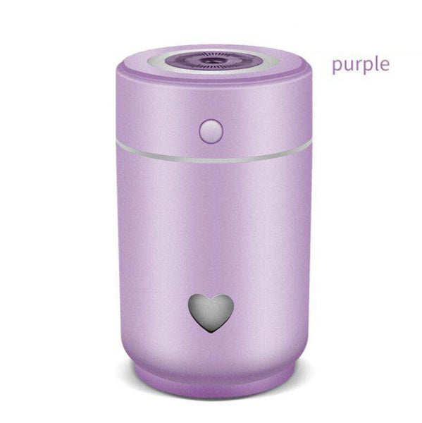 Purple compact car air purifier with heart design and easy one-button operation for clean air on the go