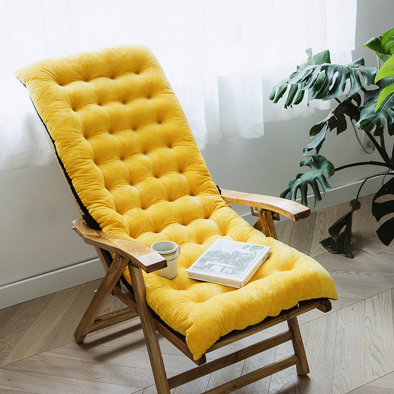 reading chair with yellow cushioned seat and wooden frame, a cozy chair for reading and relaxation