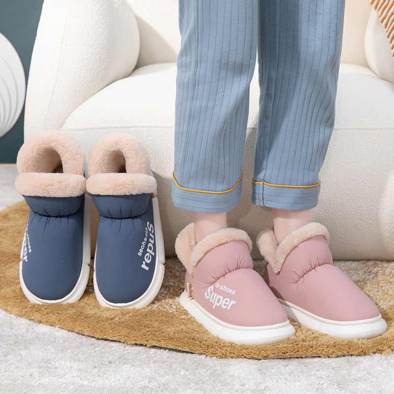 winter slippers showing cozy house slippers with fur lining in pink and navy colors on a rug