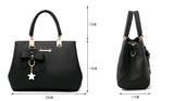 Stylish black laptop messenger bag for women with bow detail and gold accents