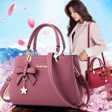 Stylish Darkbooty laptop messenger bag for women in pink, perfect for both work and casual outings