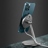 Desktop wireless charger with sleek design, holding a smartphone for convenient charging