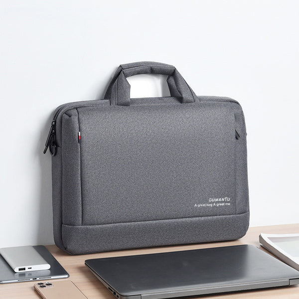 lightweight waterproof laptop briefcase in gray with sturdy handles and slim design for easy carrying
