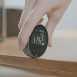 digital tape measure showing measurement on display using high precision electronic ruler