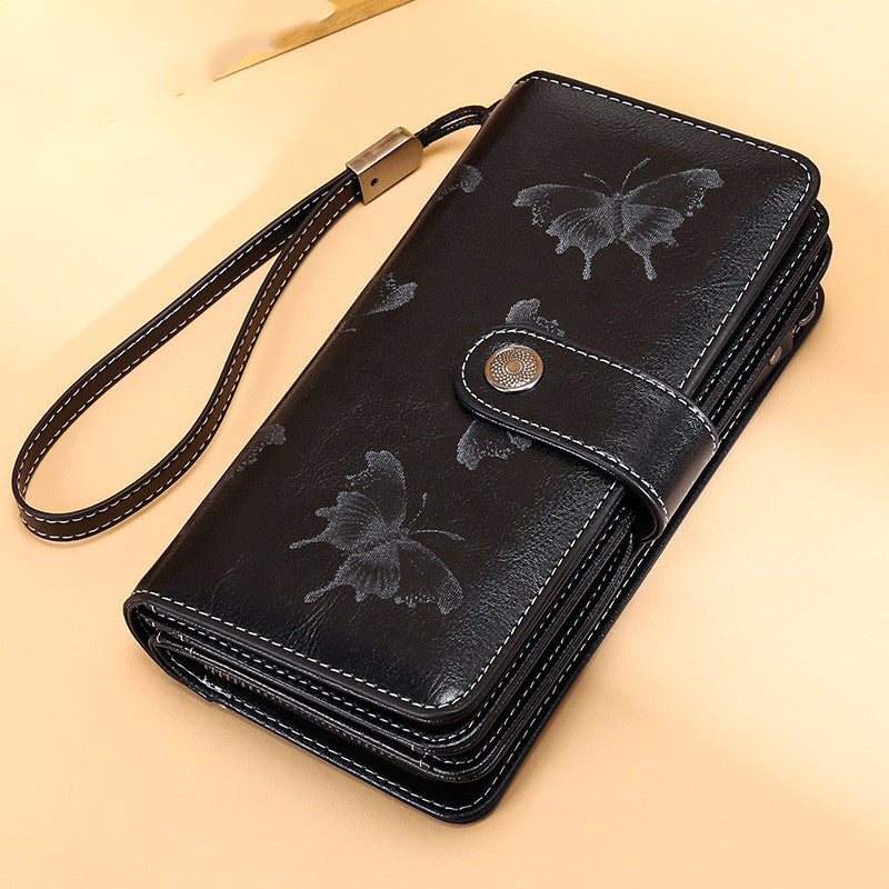 StoreFour elegant leather wallet for women in black with butterfly design and wrist strap