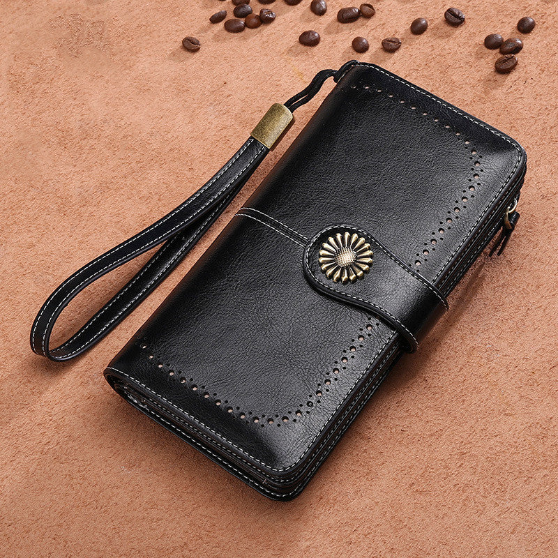 Elegant leather wallet for women black mobile phone case with wrist strap and decorative button