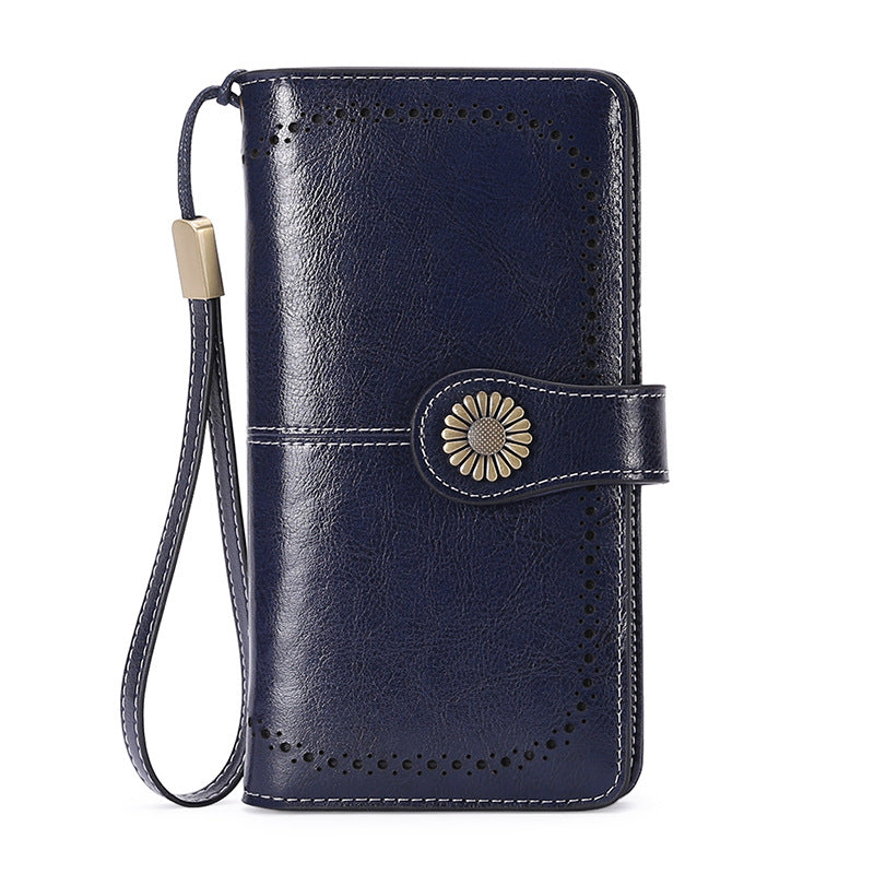 StoreFour elegant leather wallet for women in navy blue with wrist strap and floral button closure