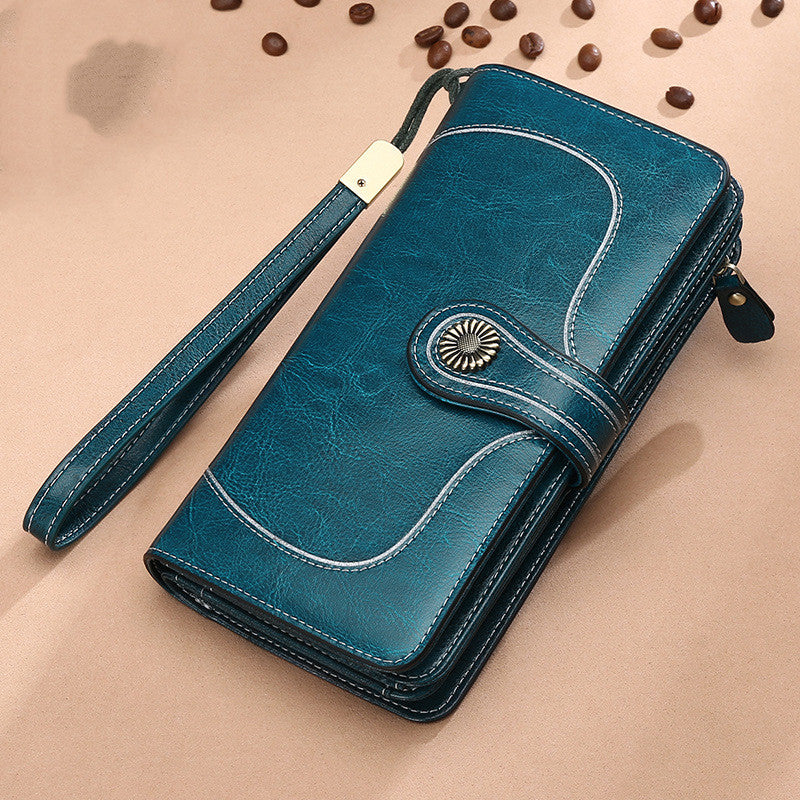 StoreFour elegant leather wallet for women mobile phone case in teal with wrist strap and button closure
