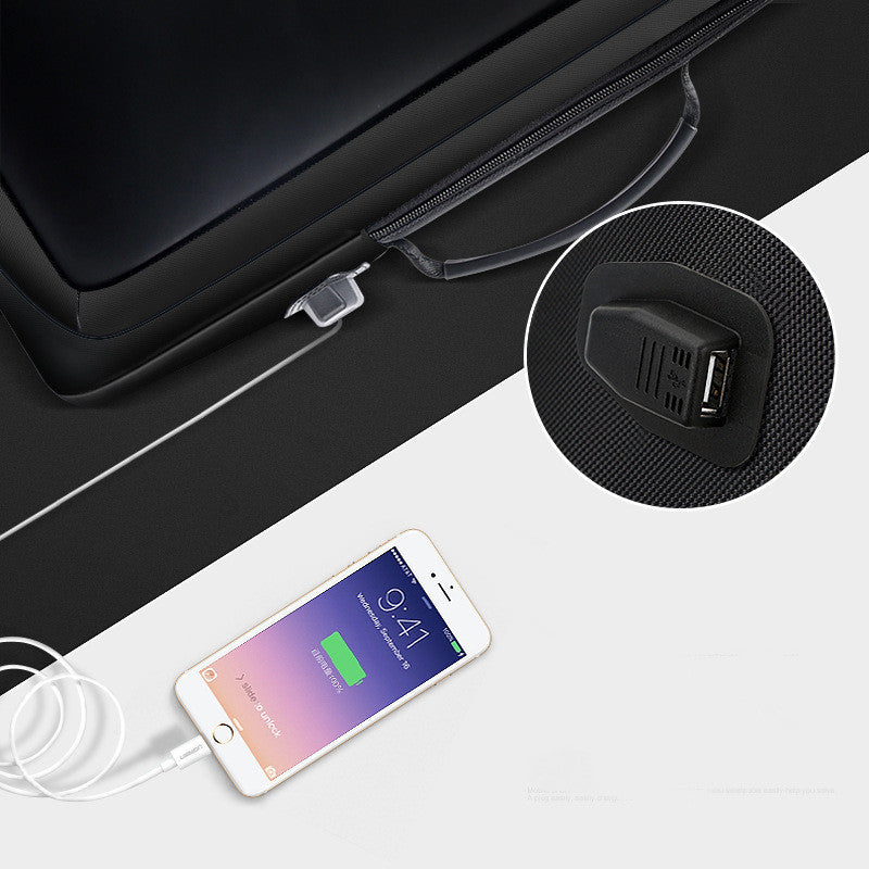 Close-up of an expandable smart business backpack with USB charging port and sleek design for professionals