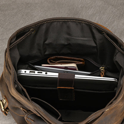 Inside view of the first-layer cowhide adventure backpack with laptop compartment and pockets