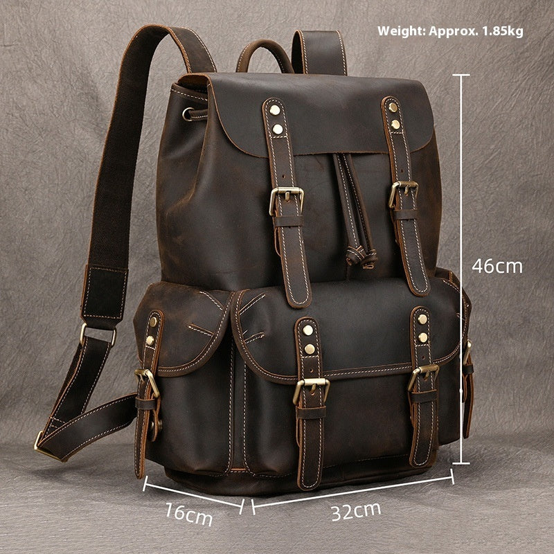 First-layer cowhide adventure backpack in dark brown with multiple pockets and adjustable straps