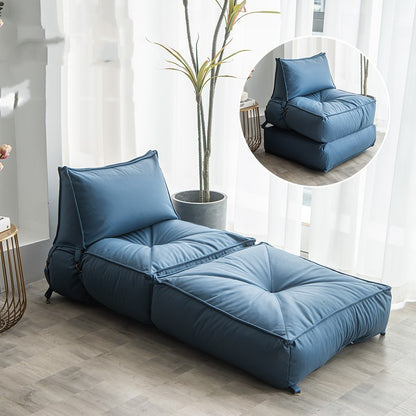 Folding lounge chair for reading in soft blue fabric, perfect for comfortable indoor relaxation