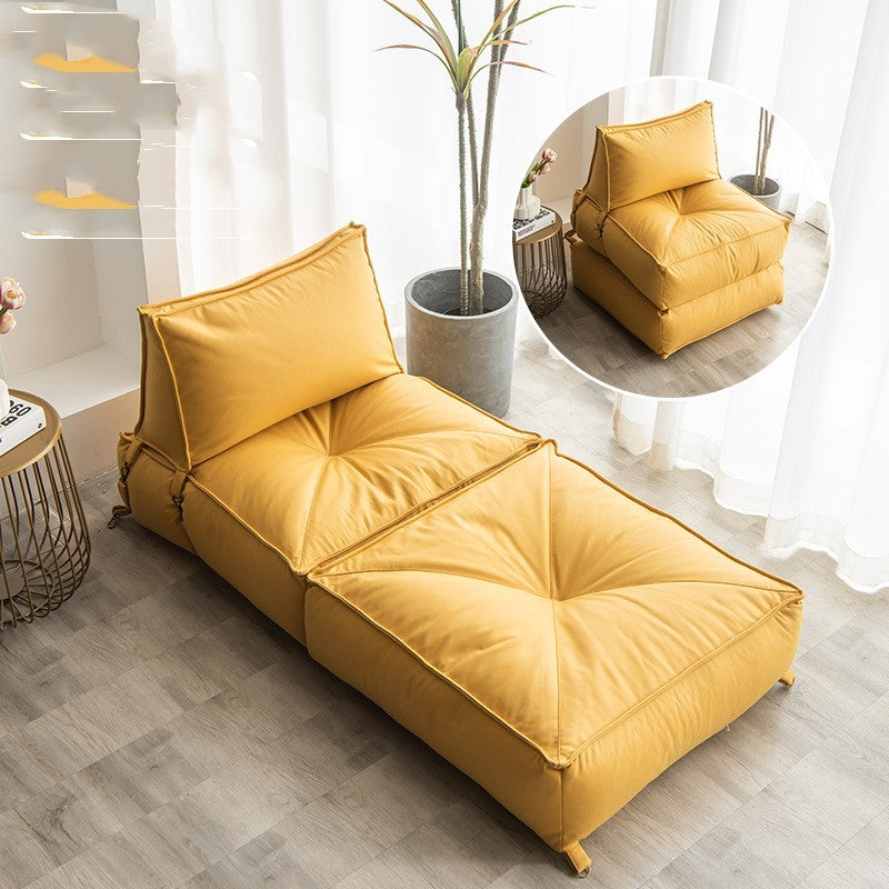 Cozy yellow folding lounge chair for reading with adjustable backrest and soft padding