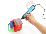 Person using four-colour 3D printing drawing pens for kids to create a colorful model house
