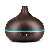 550ml ultrasonic humidifier in a wood grain finish with adjustable settings for optimal hydration