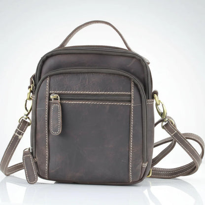 Hunter genuine leather crossbody bag with adjustable strap and front zipper pocket for convenience