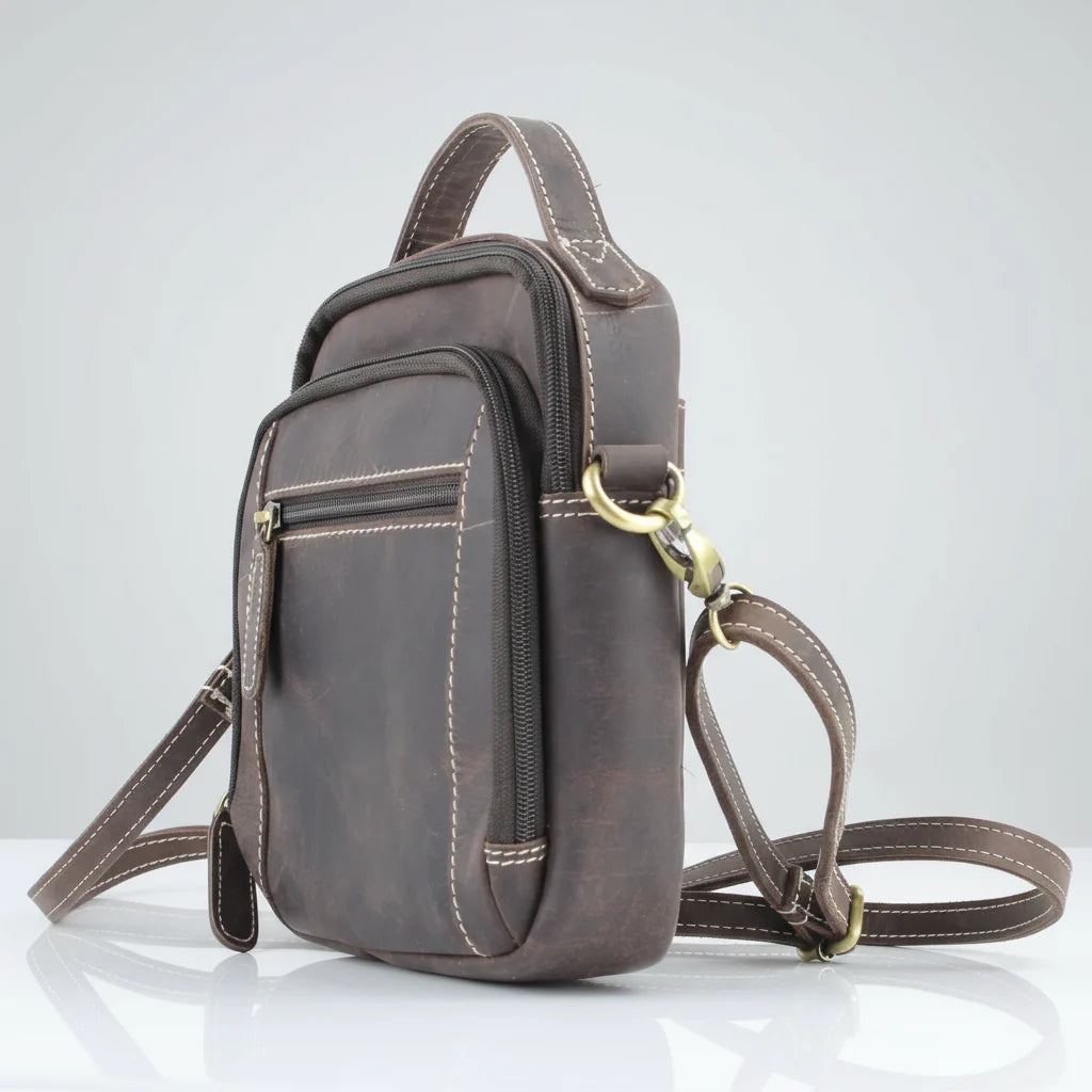 Hunter genuine leather crossbody bag with adjustable strap and multiple pockets for easy access