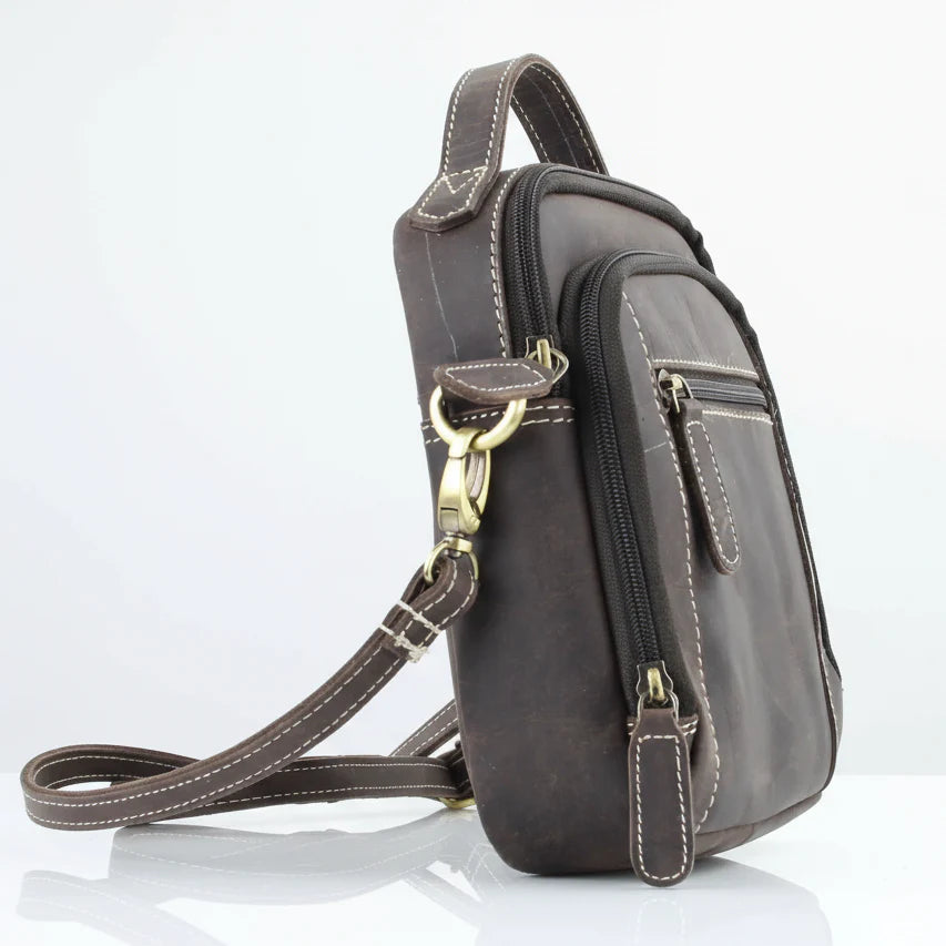 Hunter genuine leather crossbody bag with adjustable strap and front zip pocket for easy access