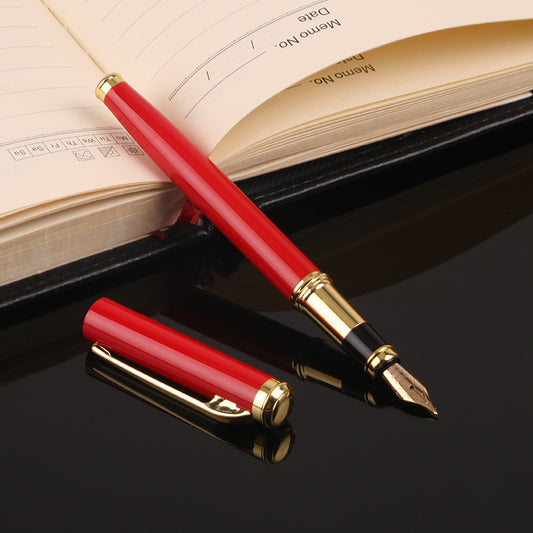 Elegant red fountain pen with gold accents, perfect ink pens for special occasions