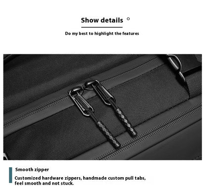 Close-up of the smooth zipper on a large-capacity business laptop bag with custom pull tabs