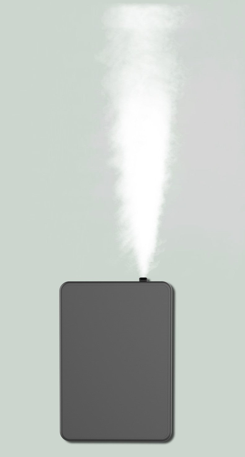 large capacity essential oil diffuser with sleek design emitting a fine mist for aromatherapy