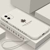 Canadian Maple Leaf iPhone case white minimalist design with central leaf motif side leaf pattern and wrist strap