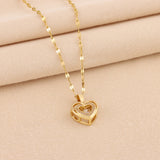 gold heart necklace with double layered heart charm on fine chain double layer love pendant for women