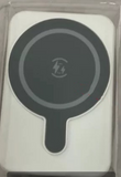White 10000mAh fast charging portable power bank with circular wireless charging pad and compact design
