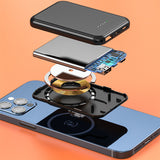 10000mAh fast charging portable power bank showing internal wireless coil and circuit components above phone