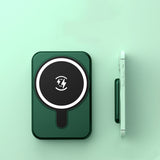10000mAh fast charging portable power bank in green with magnetic wireless pad and phone attached