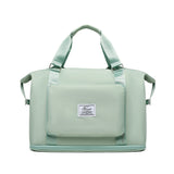 mint green nylon compact work backpack for women with top handles front pocket and structured base