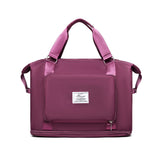 plum nylon compact work backpack for women with top handles front zip pocket and convertible straps