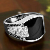 men's elegant black gemstone ring with silver band and detailed side accents