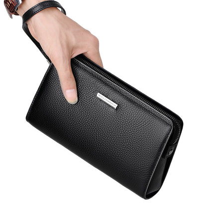 Men's leather clutch wallet in black with a sleek design and zippered closure for convenience.