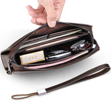 Men's leather clutch wallet in brown with multiple compartments for cards and phones
