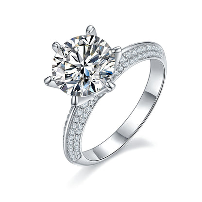 moissanite diamond engagement ring with large round center stone and paved band