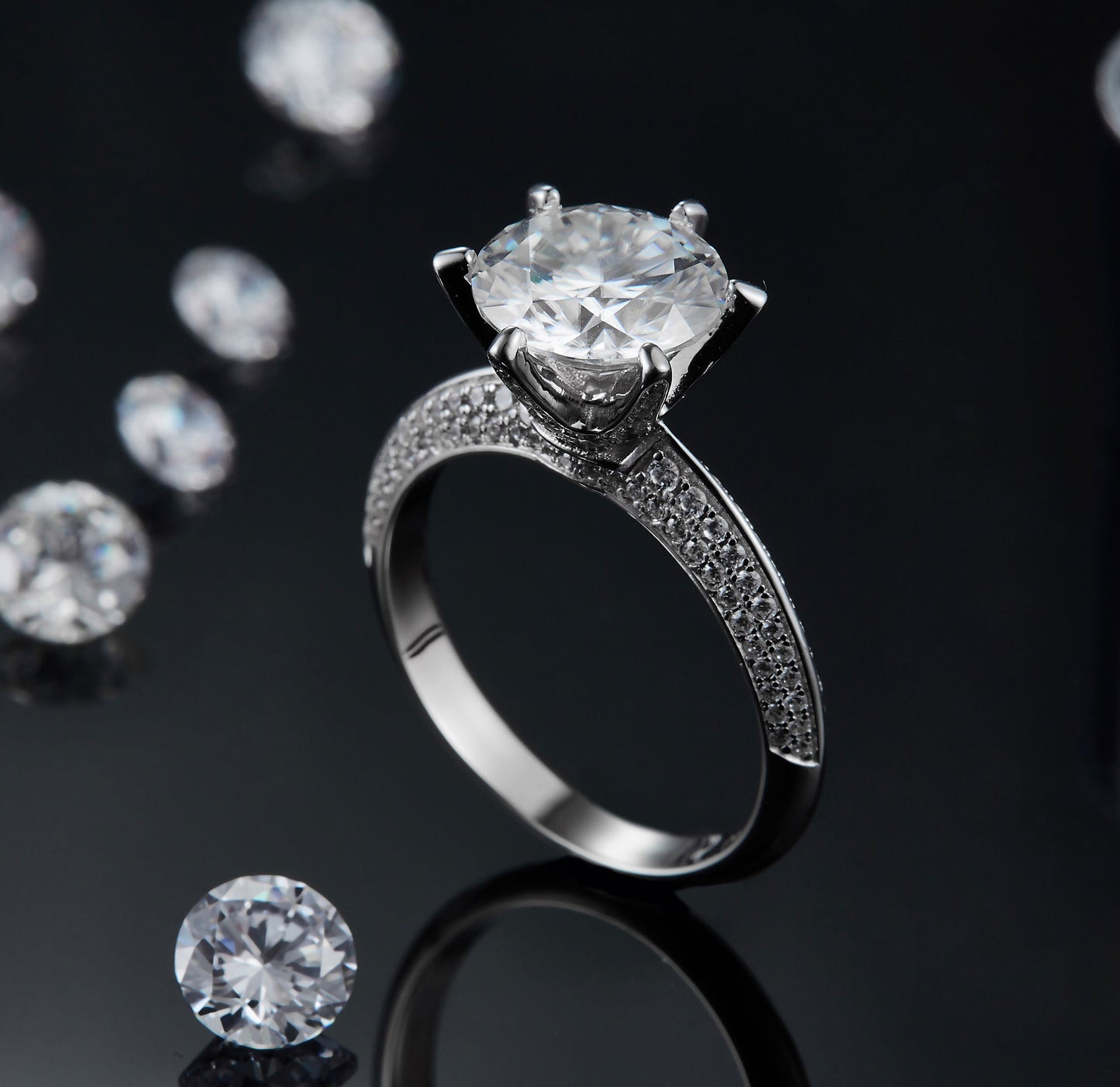 moissanite diamond engagement ring with a large center stone and paved band detailing