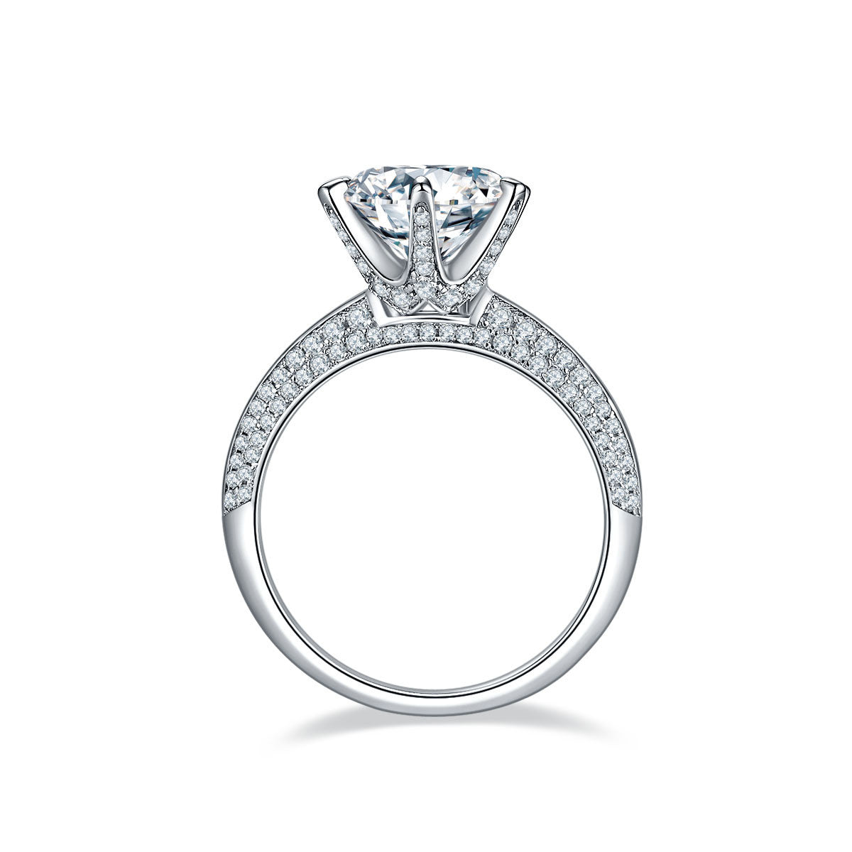 moissanite diamond engagement ring with round center stone and paved band in white metal