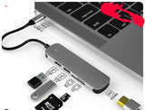 multi-interface wireless and wireline charging station with USB, HDMI, and card reader ports