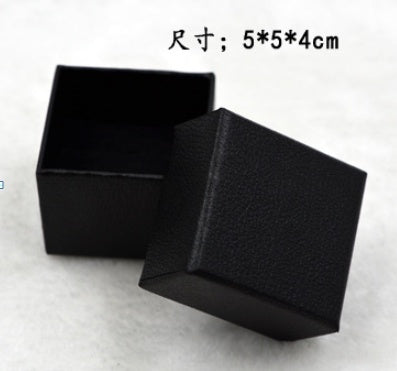 Elegant black gift box measuring 5x5x4cm, perfect for a pure tungsten steel ring for men.