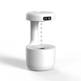 quiet home humidifier with aroma featuring a digital clock and modern design