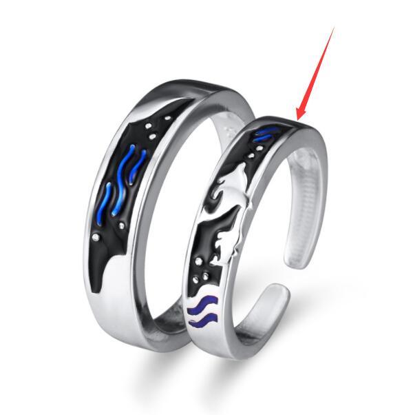 sea themed matching rings for couples featuring intricate ocean designs and contrasting colors