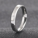 Silver Couple Ring with a Simple Design and Subtle Gemstone Accent