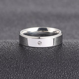 Stylish silver couple ring with a sleek design and a single diamond accent