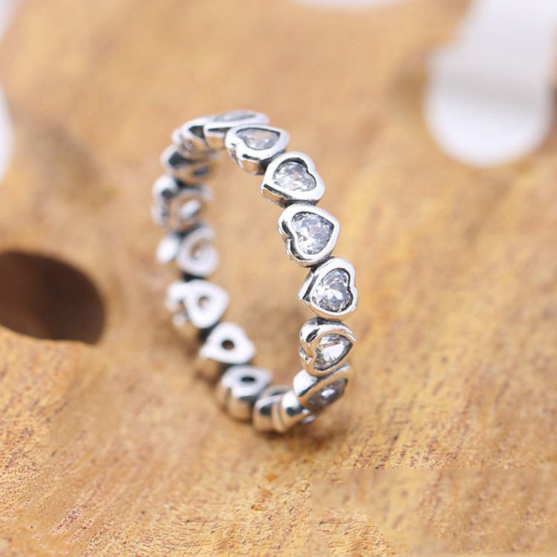 Silver Heart Diamond Ring featuring sparkling heart-shaped diamonds for a romantic look